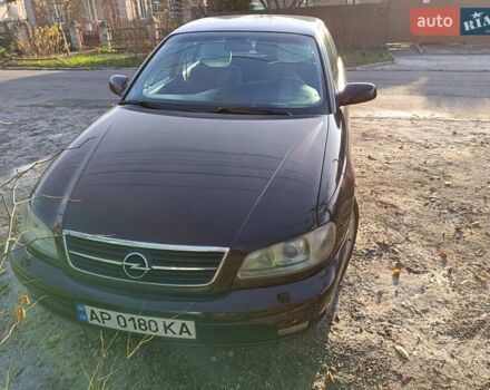 Красный Опель Омега, объемом двигателя 2.2 л и пробегом 222 тыс. км за 3500 $, фото 1 на Automoto.ua