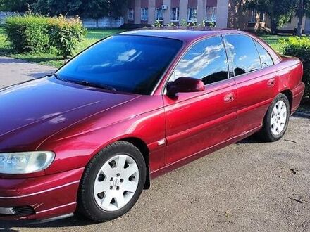 Опель Омега 2000 в Черкассах на Automoto.ua Красный Опель Омега, объемом двигателя 2.2 л и пробегом 289 тыс. км за 4700 $, фото 1 на Automoto.ua