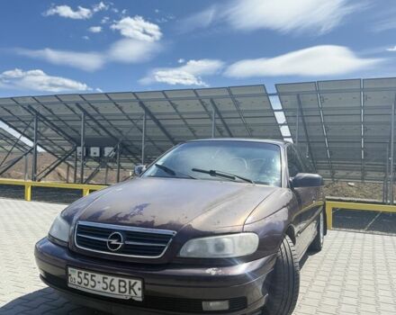 Красный Опель Омега, объемом двигателя 2.6 л и пробегом 190 тыс. км за 3300 $, фото 1 на Automoto.ua