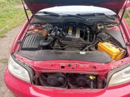 Червоний Опель Омега, об'ємом двигуна 2.2 л та пробігом 288 тис. км за 2300 $, фото 1 на Automoto.ua