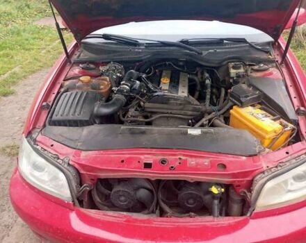 Красный Опель Омега, объемом двигателя 2.2 л и пробегом 288 тыс. км за 2300 $, фото 1 на Automoto.ua