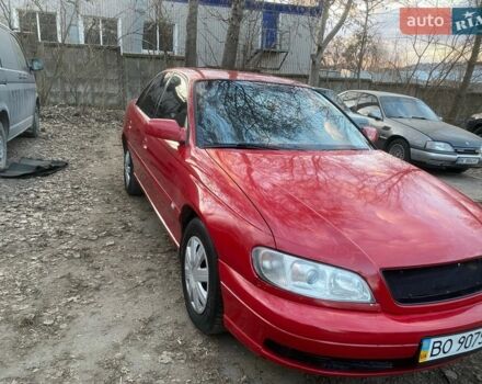 Красный Опель Омега, объемом двигателя 2.2 л и пробегом 320 тыс. км за 2400 $, фото 1 на Automoto.ua