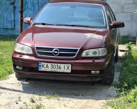 Красный Опель Омега, объемом двигателя 2.6 л и пробегом 380 тыс. км за 4197 $, фото 1 на Automoto.ua