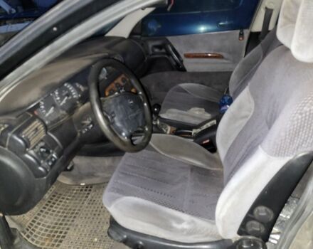 Серый Опель Омега, объемом двигателя 2 л и пробегом 350 тыс. км за 600 $, фото 2 на Automoto.ua