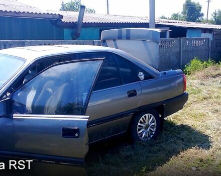 Серый Опель Омега, объемом двигателя 2.3 л и пробегом 350 тыс. км за 480 $, фото 2 на Automoto.ua