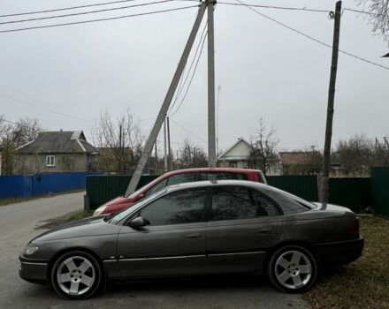 Серый Опель Омега, объемом двигателя 2 л и пробегом 248 тыс. км за 2600 $, фото 7 на Automoto.ua