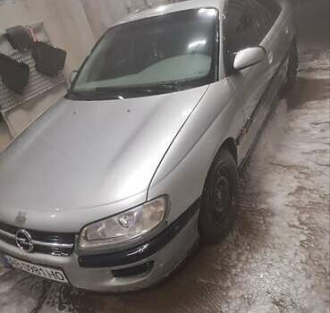 Сірий Опель Омега, об'ємом двигуна 2 л та пробігом 550 тис. км за 1800 $, фото 4 на Automoto.ua