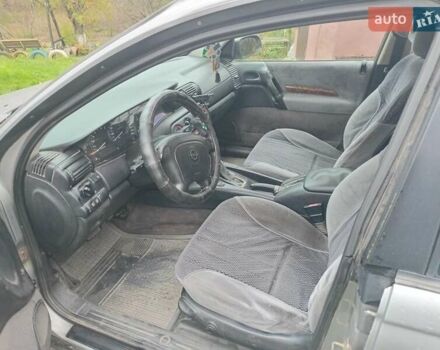 Сірий Опель Омега, об'ємом двигуна 2.5 л та пробігом 246 тис. км за 2200 $, фото 3 на Automoto.ua