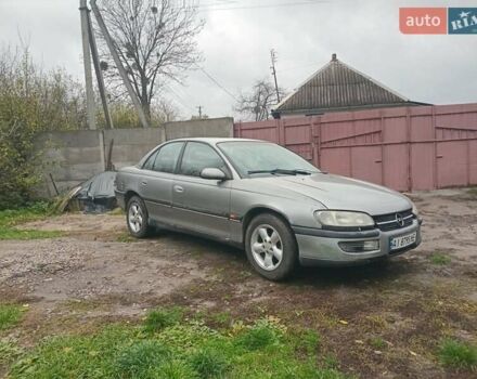 Сірий Опель Омега, об'ємом двигуна 2.5 л та пробігом 246 тис. км за 2200 $, фото 2 на Automoto.ua