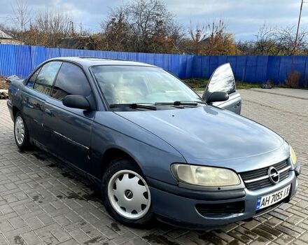 Серый Опель Омега, объемом двигателя 2 л и пробегом 390 тыс. км за 1000 $, фото 4 на Automoto.ua