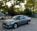 Сірий Опель Омега, об'ємом двигуна 2 л та пробігом 200 тис. км за 1050 $, фото 1 на Automoto.ua