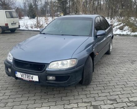 Сірий Опель Омега, об'ємом двигуна 2 л та пробігом 316 тис. км за 1400 $, фото 4 на Automoto.ua