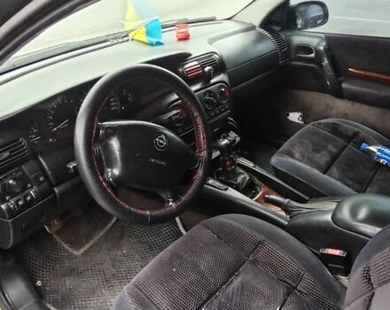 Серый Опель Омега, объемом двигателя 2 л и пробегом 470 тыс. км за 1700 $, фото 6 на Automoto.ua