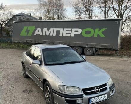 Серый Опель Омега, объемом двигателя 2.5 л и пробегом 300 тыс. км за 1699 $, фото 3 на Automoto.ua