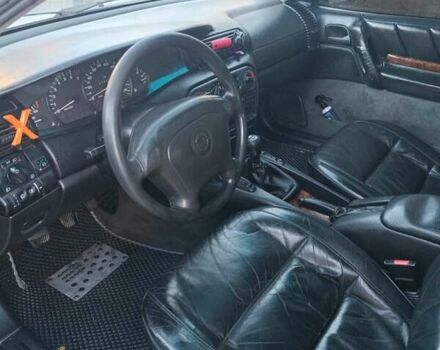 Серый Опель Омега, объемом двигателя 2 л и пробегом 408 тыс. км за 2250 $, фото 6 на Automoto.ua