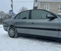 Серый Опель Омега, объемом двигателя 2 л и пробегом 320 тыс. км за 2300 $, фото 5 на Automoto.ua