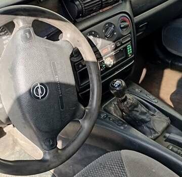 Сірий Опель Омега, об'ємом двигуна 2 л та пробігом 390 тис. км за 1200 $, фото 2 на Automoto.ua