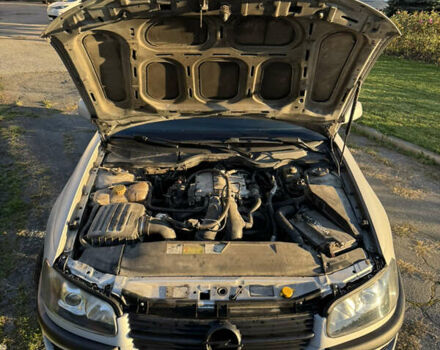 Серый Опель Омега, объемом двигателя 2.5 л и пробегом 462 тыс. км за 2800 $, фото 14 на Automoto.ua