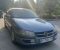 Серый Опель Омега, объемом двигателя 2 л и пробегом 404 тыс. км за 1900 $, фото 1 на Automoto.ua