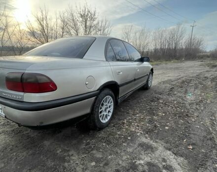 Сірий Опель Омега, об'ємом двигуна 2 л та пробігом 400 тис. км за 2000 $, фото 2 на Automoto.ua