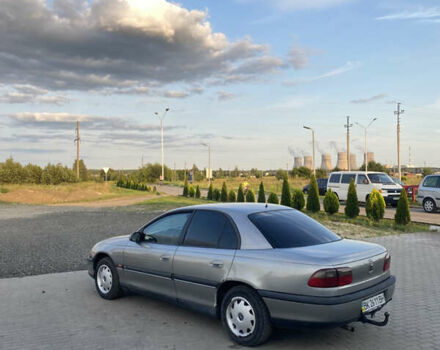 Серый Опель Омега, объемом двигателя 2 л и пробегом 195 тыс. км за 1650 $, фото 2 на Automoto.ua