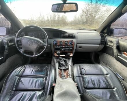 Сірий Опель Омега, об'ємом двигуна 2 л та пробігом 400 тис. км за 2000 $, фото 4 на Automoto.ua