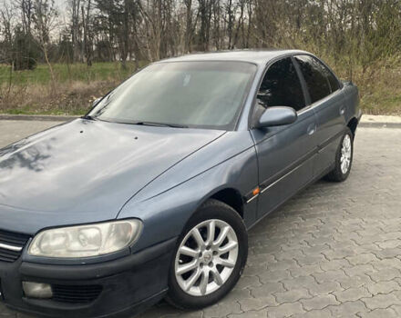 Серый Опель Омега, объемом двигателя 2 л и пробегом 312 тыс. км за 1600 $, фото 2 на Automoto.ua