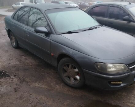 Серый Опель Омега, объемом двигателя 2.5 л и пробегом 345 тыс. км за 1300 $, фото 6 на Automoto.ua