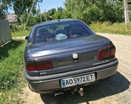 Сірий Опель Омега, об'ємом двигуна 2 л та пробігом 368 тис. км за 1350 $, фото 4 на Automoto.ua