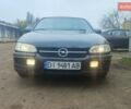 Серый Опель Омега, объемом двигателя 2.5 л и пробегом 300 тыс. км за 1700 $, фото 8 на Automoto.ua