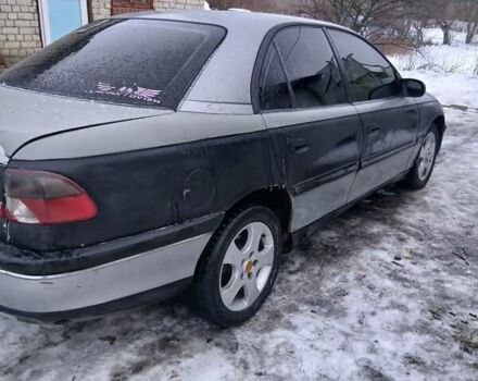 Сірий Опель Омега, об'ємом двигуна 2 л та пробігом 100 тис. км за 1250 $, фото 4 на Automoto.ua
