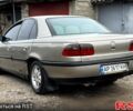 Сірий Опель Омега, об'ємом двигуна 2 л та пробігом 297 тис. км за 1950 $, фото 1 на Automoto.ua