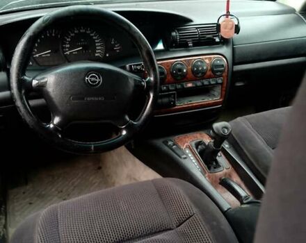 Серый Опель Омега, объемом двигателя 2.5 л и пробегом 100 тыс. км за 700 $, фото 3 на Automoto.ua