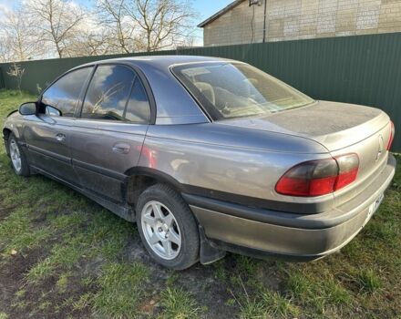 Серый Опель Омега, объемом двигателя 2.5 л и пробегом 300 тыс. км за 850 $, фото 3 на Automoto.ua