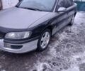 Сірий Опель Омега, об'ємом двигуна 2 л та пробігом 100 тис. км за 1250 $, фото 1 на Automoto.ua