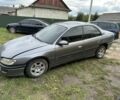 Серый Опель Омега, объемом двигателя 2.5 л и пробегом 300 тыс. км за 870 $, фото 1 на Automoto.ua