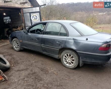 Серый Опель Омега, объемом двигателя 2.5 л и пробегом 100 тыс. км за 700 $, фото 2 на Automoto.ua