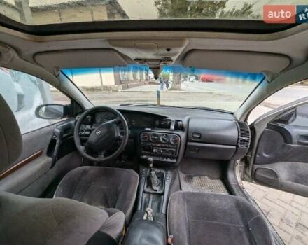 Серый Опель Омега, объемом двигателя 2 л и пробегом 400 тыс. км за 1900 $, фото 8 на Automoto.ua