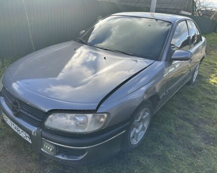 Сірий Опель Омега, об'ємом двигуна 2.5 л та пробігом 300 тис. км за 400 $, фото 1 на Automoto.ua