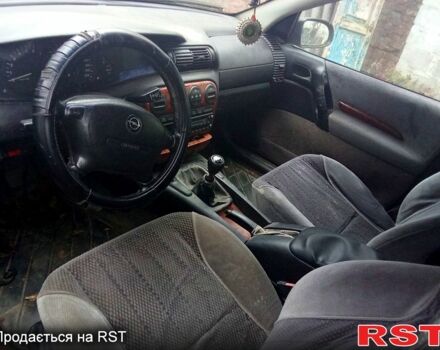 Сірий Опель Омега, об'ємом двигуна 2 л та пробігом 155 тис. км за 1000 $, фото 2 на Automoto.ua