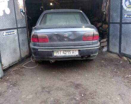 Серый Опель Омега, объемом двигателя 2.5 л и пробегом 100 тыс. км за 700 $, фото 1 на Automoto.ua