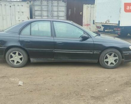 Серый Опель Омега, объемом двигателя 2.5 л и пробегом 300 тыс. км за 1700 $, фото 3 на Automoto.ua