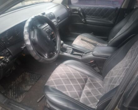Сірий Опель Омега, об'ємом двигуна 2 л та пробігом 300 тис. км за 1500 $, фото 4 на Automoto.ua