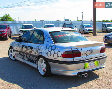 Серый Опель Омега, объемом двигателя 3 л и пробегом 326 тыс. км за 3200 $, фото 2 на Automoto.ua