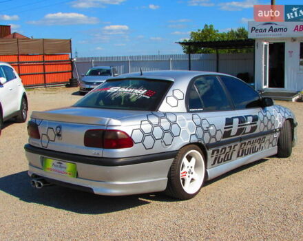 Серый Опель Омега, объемом двигателя 3 л и пробегом 326 тыс. км за 3200 $, фото 1 на Automoto.ua