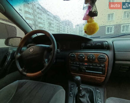 Серый Опель Омега, объемом двигателя 2.5 л и пробегом 364 тыс. км за 1800 $, фото 5 на Automoto.ua