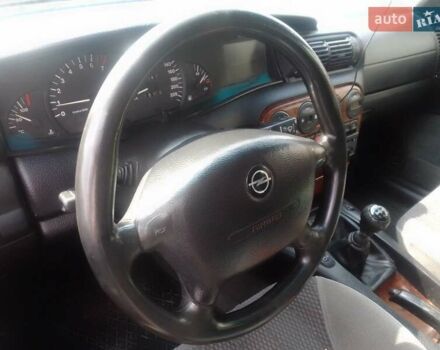 Серый Опель Омега, объемом двигателя 2 л и пробегом 300 тыс. км за 1700 $, фото 4 на Automoto.ua