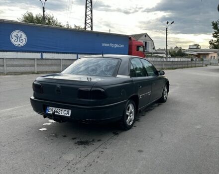 Сірий Опель Омега, об'ємом двигуна 2 л та пробігом 200 тис. км за 1200 $, фото 4 на Automoto.ua
