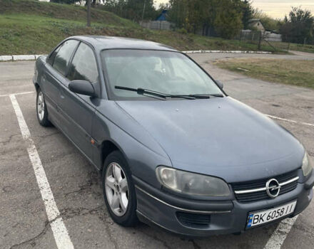 Сірий Опель Омега, об'ємом двигуна 2 л та пробігом 300 тис. км за 1800 $, фото 2 на Automoto.ua