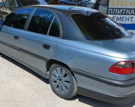 Сірий Опель Омега, об'ємом двигуна 3 л та пробігом 350 тис. км за 2000 $, фото 1 на Automoto.ua